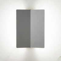 Applique à volet pivotant plié