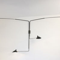 Wall lamp with 4 pivoting arms